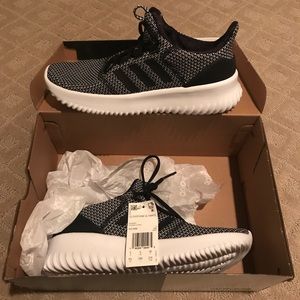 Adidas Cloudfoam ultimate , kids size.